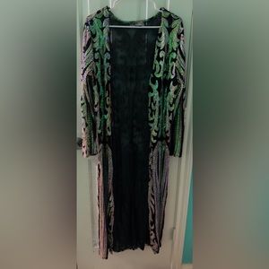 Black sequence cover up, size medium, excellent condition.